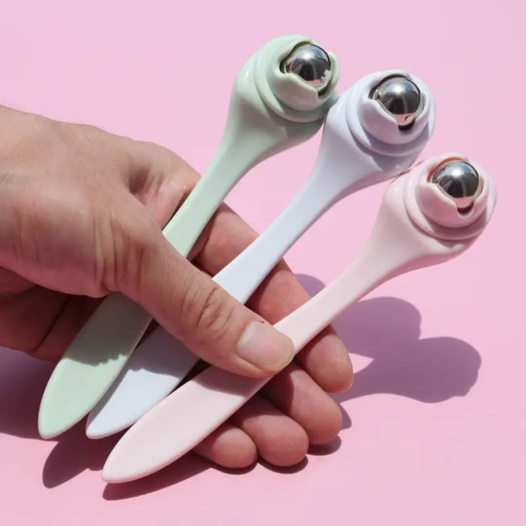 Herramienta de masaje facial para aliviar bolsas, ojeras y tensiones alrededor de los ojos.
