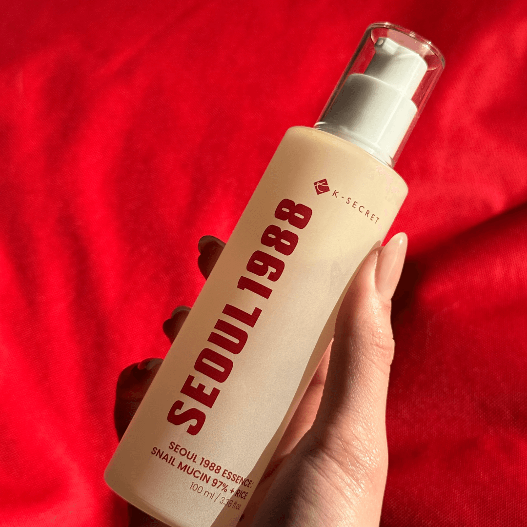 Snail + Rice Essence Ksecret esencia hidratante de arroz con mucina de caracol para reparar la piel.