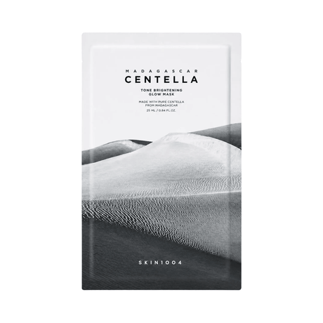 Mascarilla facial SKIN1004 Madagascar Centella Tone Brightening Glow Mask con centella asiática que ayuda a calmar, hidratar e iluminar la piel para un tono más uniforme.