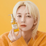 Tratamiento capilar en aceite con textura nutritiva que ayuda a sellar la humedad y proteger la fibra del cabello frente a la resequedad.